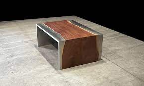 Its solid, reclaimed wood tops and strong metal legs make a statement in your living space. Steel And Wood Coffee Table By Johnhoushmand
