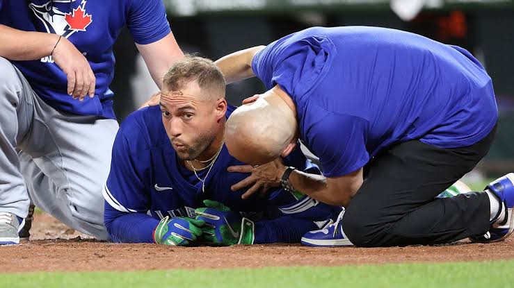 Blue Jays' George Springer hit in head with 96 mph fastball, leaves game  with help of trainers