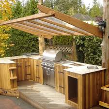Outdoor island kitchens offer the pleasure of entertaining family and friends with good times and good food. Covered Outdoor Kitchen Houzz
