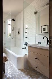 Beige and white is a safe and timeless choice for any room in the house. Bathroom Make Over Matte Black Hardware White Subway Tile With Beige Grout Black Bathroom Beige Bathroom Simple Bathroom Renovation