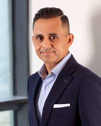 Danish Aman Receiving a crest from Air Vice Martial( R )Dr Rizwan Riaz.