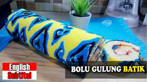 A swiss roll, jelly roll, roll cake, cream roll, roulade or swiss log is a type of rolled sponge cake filled with whipped cream, jam, or icing.the origins of the term are unclear; Bolu Gulung Batik By Yani Cakes 177 Youtube