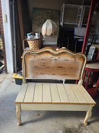 Handmade beautiful wooden bench made from an old bed frame. Solid wood. 43"  wide 43" tall