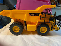 Image result for Caterpillar Yellow 1995 Fleet