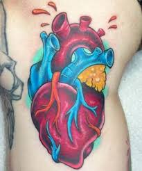 Colorful heart tattoos on wrist. 16 Awesome And Creative Anatomical Heart Tattoo Designs