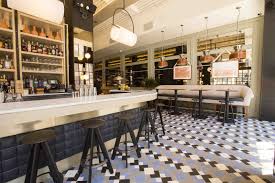 Inside Proxi Where Sepia S Andrew Zimmerman Will Unleash Global Flavors Eater Chicagoclockmenumore Ar Rustic Wood Floors Restaurant Design Commercial Design