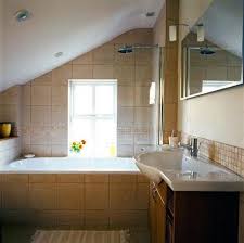 And the first thing to notice here is that it is placed along the sloped ceiling because you won't need to stand. Small Bathroom Slanted Ceiling Novocom Top