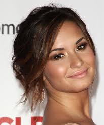 I went on picnik (www.picnik.com) and used the doodle effect. Demi Lovato Long Curly Dark Mocha Brunette Updo With Side Swept Bangs And Red Highlights