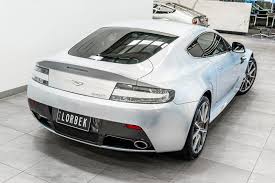 Image result for Lightning Silver 2011 Aston Martin