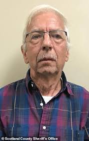 Feud between elderly neighbors ends in murder as husband and wife are  arrested for shooting