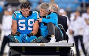 Carolina Panthers Luke Kuechly Tries On Q Collar After 2016 Concussion