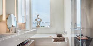 When you have a crisp white bathroom as a backdrop, try dressing it up with some fabulous accessories such as a venetian mirror with intricate detailing. 30 Stunning White Bathrooms How To Use White Tile And Fixtures In Bathrooms