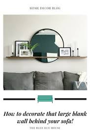 How To Decorate The Large Wall Behind Your Sofa Modern Living Room Wall Family Room Wall Decor Large Wall Decor Living Room