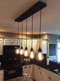 Caged Pendant Light Reclaimed Wood Chandelier From Hangout Lighting A Perfect Installation To Add Light Rustic Kitchen Lighting Rustic Kitchen Rustic Lighting