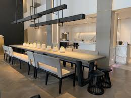 A likewise long kitchen, at one end of which is a more friendly dining area, completes a triumvirate of zones. Kelly Hoppen Dining Room Sophie Robinson