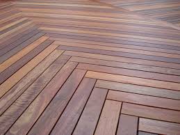 The Very Beautiful Dark Red Meranti Each Board Is So Different Amazing Located In Calgary Alberta Supplied By Ka Deck Flooring Outdoor Tiles Deck Patterns