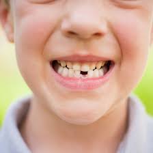 The Tooth Fairy And Losing A First Baby Tooth