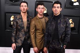 Three brothers from new jersey jonasbrothers.lnk.to/lbylm. Jonas Brothers Tease New Music Talk Nick S Spinach Teeth At The Grammys Watch Billboard Billboard