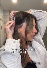 Accent Face Pieces Pulled Back into Small Clips Hair Style