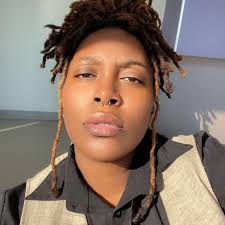 Why do cats like to watch water go down the drain or shower?