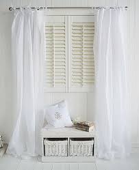 White Living Room With White Voile Curtains And Window Seat White Furniture Living Room White Voile Curtains Living Room Furniture