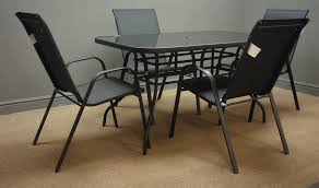 Dkiei outdoor round dining table tempered glass top bistro table for garden patio balcony backyard black, 60 * 60 * 71cm 4.6 out of 5 stars 5 £59.99 £ 59. Retangular Tempered Black Glass Top Garden Table 135cm X 85cm H73cm And Set Four Matching Chairs Antiques Interiors