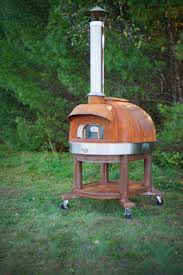 Corten Model 99 With Stand Made By Maine Wood Heat Company Wood Fired Oven Le Panyol Portable Pizza Oven Wood Fired Oven Wood Heat Wood Burning Oven