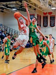 Blackhawks stay in title hunt with win over Trojans