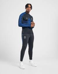 The hoodie comes in an overhead design with a drawcord hood for coverage, while the matching joggers have an elasticated waistband for the perfect fit. Psg Drill Tracksuit Shop Clothing Shoes Online
