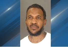 Man charged with murder of woman found dead in house fire