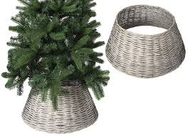 These round wicker tree skirts will hide your unsightly bucket or stand and add style to your christmas tree this year. Natural Wicker Christmas Tree Skirt Natural Woven Wicker Christmas Tree Skirt