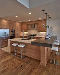 Cucina In Legno Con Isola E Penisola Ad L Con Bancone Bar Top In Cemento Molto Robusto Che Aggiung Kitchen Design Open Best Kitchen Designs Kitchen Sink Decor