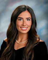 The women of St. Scholastic Academy receive their diplomas