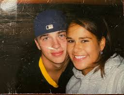 Can someone edit this photo to remove wrinkles and a gouge?