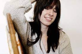 For curls falling to one side, use the comb to make a deep side part. How To Style Your Bangs Without Heat Super Easy Well Good