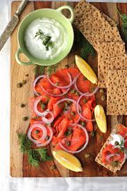 Smoked salmon and sour cream balinis mini toad in the hole with caramelized red onion roasted red pepper and tomato shots thai mini crab cakes. Smoked Salmon Platter Breakfast Party Menu Seafood Dinner Party Best Party Food