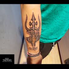 We have listed some of the best trishul tattoos for the wrist, arms, and shoulder. 20 Best Trishul Tattoo Trishul Tattoo Designs Lord Shiva Trishul Tattoo