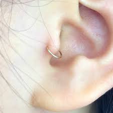 The removable gem stud has a tiny groove that snaps in the shaft which holds both pieces together securely. Amazon Com Tiny Gold Tragus Hoop Earrings 5mm 14k Gold Filled Small Hoop Earrings For Nose Cartilage Helix Handmade Products
