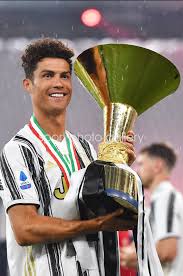 Dortmund reach german cup final, inter put one hand on serie a trophy. Cristiano Ronaldo Juventus V As Roma Serie A Trophy 2020 Images Football Posters