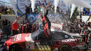 The 2015 nascar xfinity series was the 34th season of the 2nd tier xfinity series, a professional stock car racing tour sanctioned by nascar in the united states. Nascar Xfinity Series Chris Buescher Wins At Dover