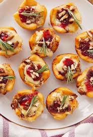 Whip up a delicious thanksgiving appetizer to start your holiday dinner right. These Thanksgiving Appetizers Are So Delicious You Ll Forget All About The Turkey Brie Bites Delish Recipes Holiday Cooking