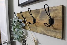 Wooden towel rack with colorful towels. Farmhouse Style Diy Towel Rack Using Scrap Wood Her Happy Home