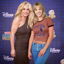 Here's what else to know today. Brinny Posing With Her Younger Self Britney Spears Breatheheavy Exhale