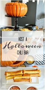 Layered bean dips are another good option for a chili dinner. Halloween Chili Bar Party Ideas Moms Munchkins Easy Halloween Food Halloween Food For Party Chili Bar Party