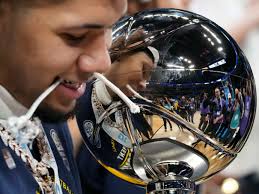 Hoops, goldfish platforms and a raucous town hall. See Indy in March 2025