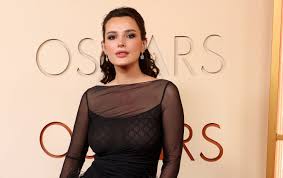 Bella Thorne Stuns at Oscars in Sheer Dress – Here's Why It Matters