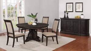 Two tone dining tables with brown table top and black legs. Whitney Round Dining Table Set 121280 Burnished Black Coaster
