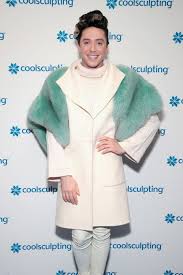 Johnny Weir S Olympic Hair Barrette Sparks Reactions Skater Compared To Caesar Flickerman