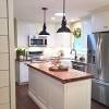 The white helps soften the counter visually, letting it fit in better with the rest of the room. 1
