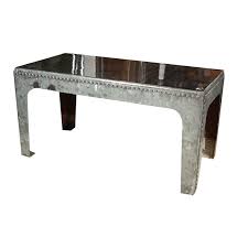If it's a water spill that has left white marks or a blush on your table, it can be repaired. Industrial Water Tank Coffee Table Galvanized Metal Rivets At 1stdibs